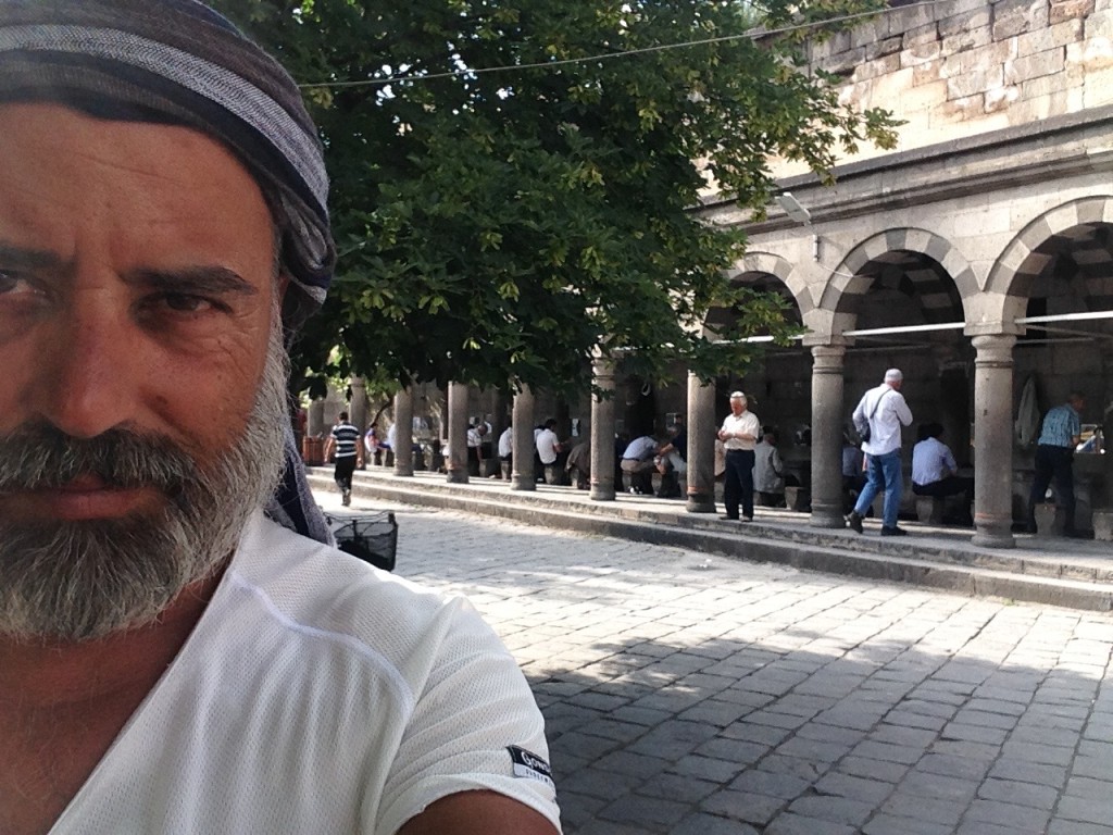 in front of the Mosquee, while men washing their feet as a muslim tradition.