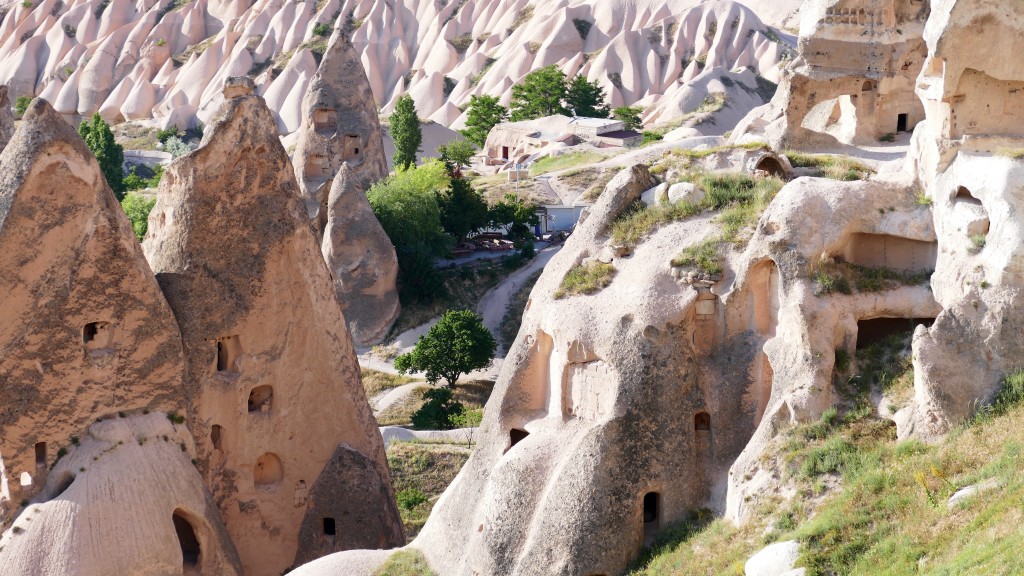 Cappadocia (Turkish: Kapadokya) is an area in Central Anatolia in Turkey best known for its unique moon-like landscape, underground cities, cave churches and houses carved in the rocks.