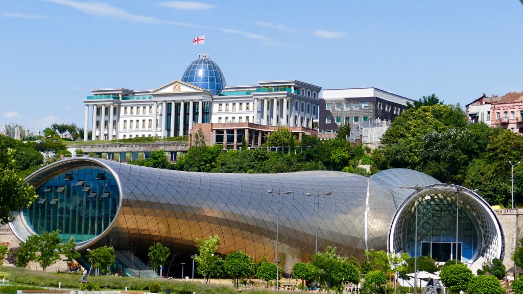 Djansug Kakhidze Tbilisi center for Music and Culture and the presidential palace on the back.