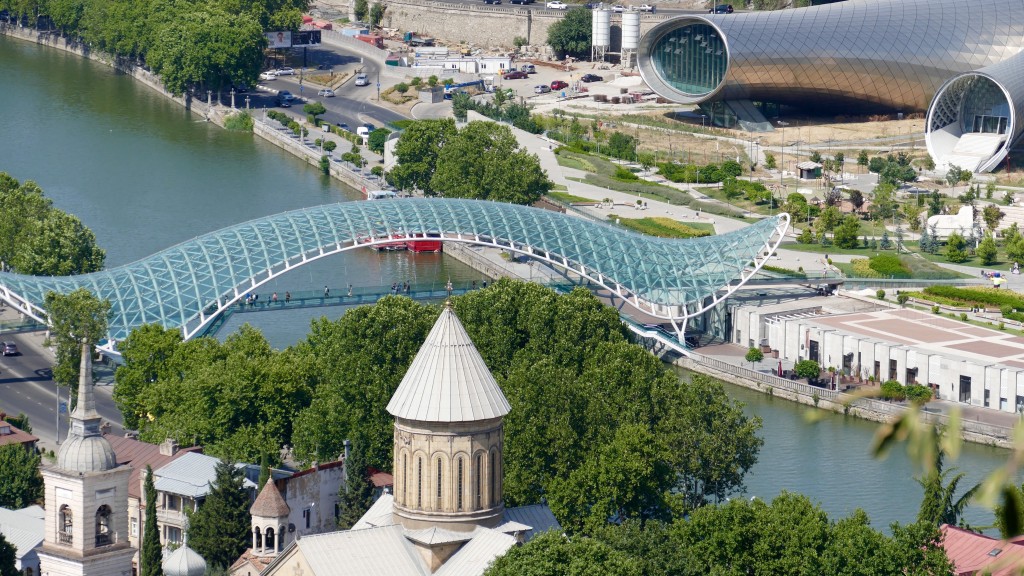 The Mtkvari River, the Bridge of Peace, and the Djansug Kakhidze Tbilisi center for Music and Culture
