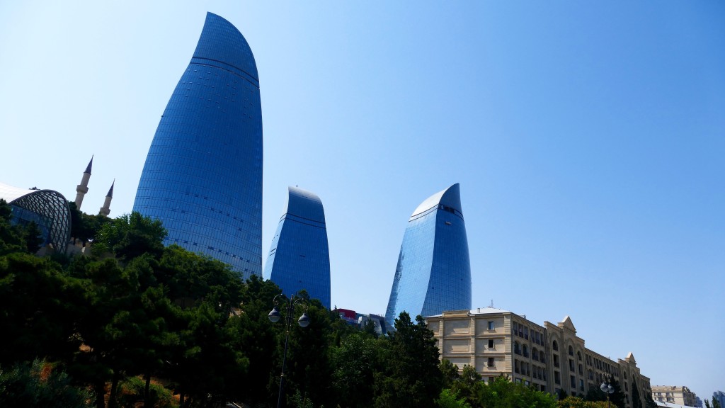 Flame Towers (Azerbaijani: Alov Qüllələri) is the tallest skyscraper in Baku, Azerbaijan with a height of 190 m (620 ft). The buildings consist of apartments, a hotel and office blocks. The estimated cost of Flame Towers is around US$350 million. Construction began in 2007, with completion in 2012. HOK was the architect for the project, DIA Holdings served as the design-build contractor, and Hill International provided project management. The facades of the three Flame Towers are turned into gigantic display screens with the use of more than 10,000 high-power LED luminaires, supplied by the Osram subsidiary Traxon Technologies and Vetas Electric Lighting. On 5 June 2014, Lamborghini opened a branch in Azerbaijan for the first time. Its dealership is located on the ground floor of the East tower of the Flame Towers.