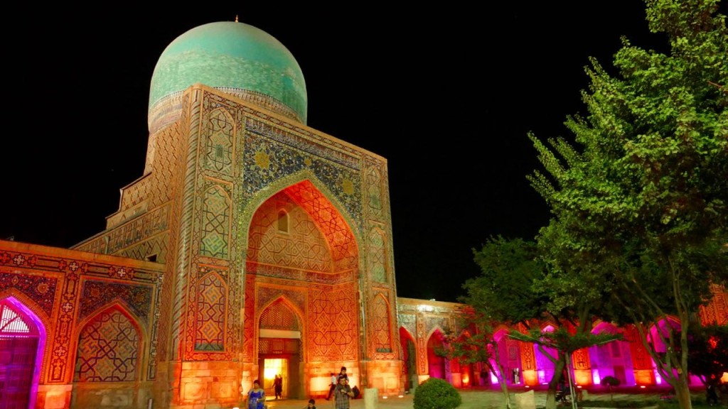 Several years later, the same ruler of Samarkand ordered the third Tilla-Kari Madrassah. It’s outward is the same as those two other medresses, but coming in you’ll see a one story building. To make the architectural ensemble, the architecture made two floors on the outside but only one inside. Madrassah was always built by one project – four-cornered yard with four terraces and cells along the whole perimeter. The main entrance was always locked with lattice and two other entrances were used by purpose. The doors in cell were always low because “Islam” means “obedience”, that is why everyone who entered or went out of cell always had to bow, it was like greeting and wishing health to everyone. Only Tilla-Kari Madrassah was bult like medresse, but was used mostly as mosque; just looking at minarets can see this, Tilla-Kari has low minarets to call people to pray.